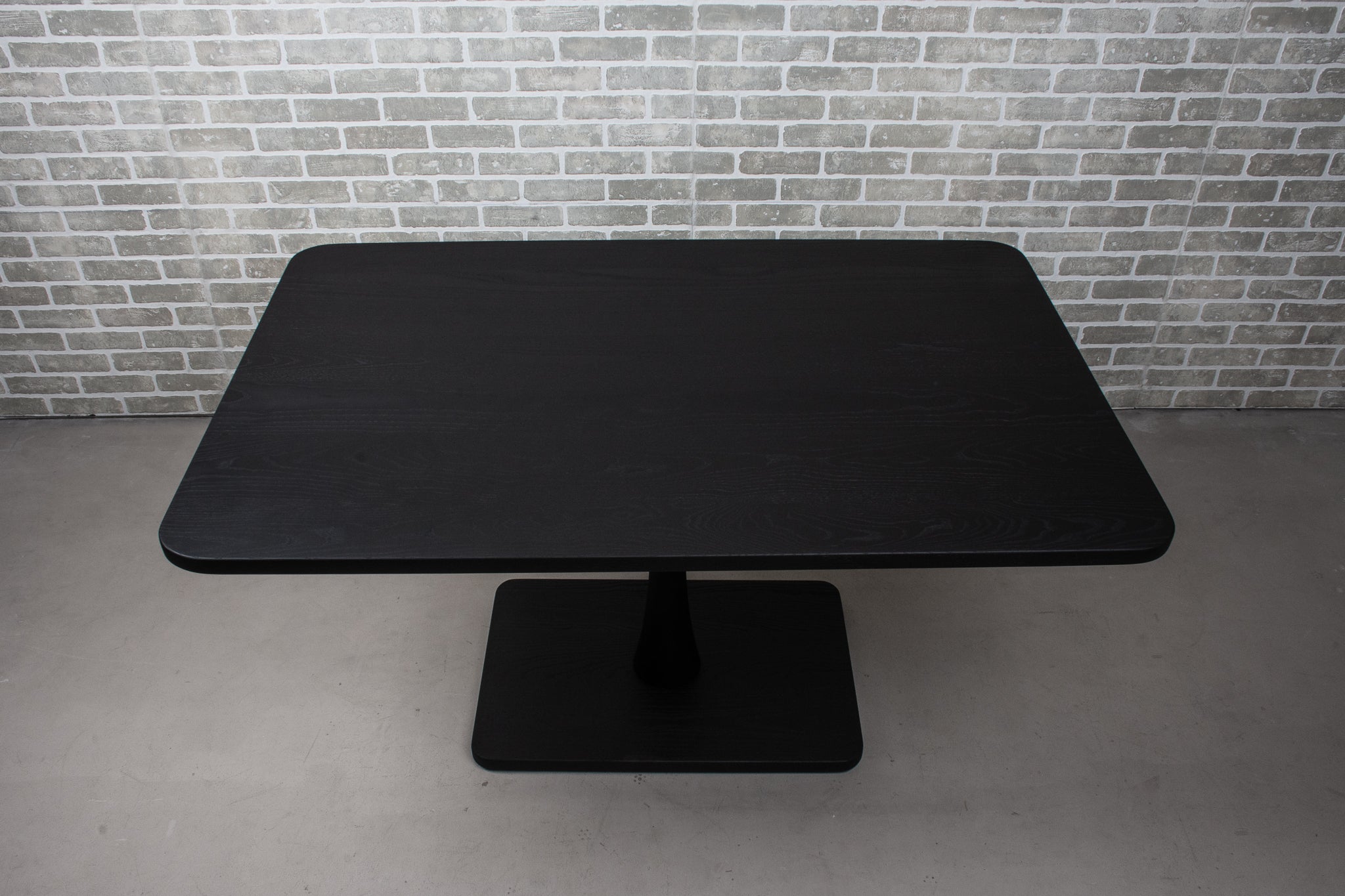 Custom Walnut table on Jarvis base for Molly and her clients in Bozeman