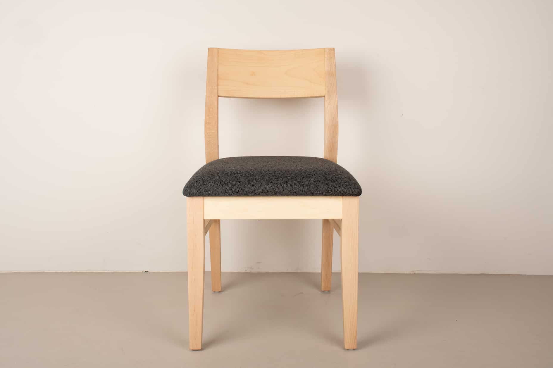 charcoal fabric seat on natural maple seat