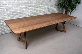 maple table finished in coconut on matching caldwell legs
