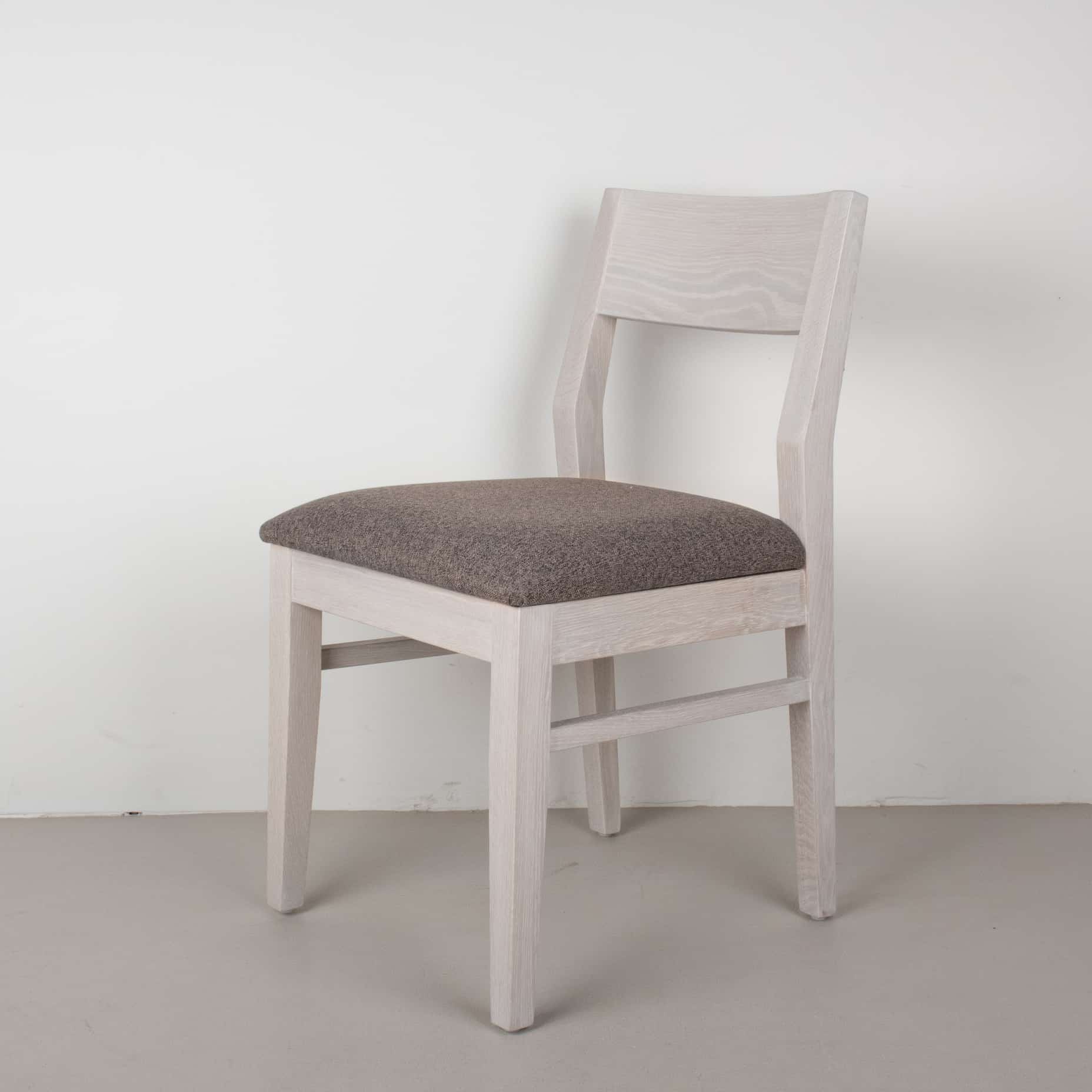 graphite faux leather seat on white oak chair