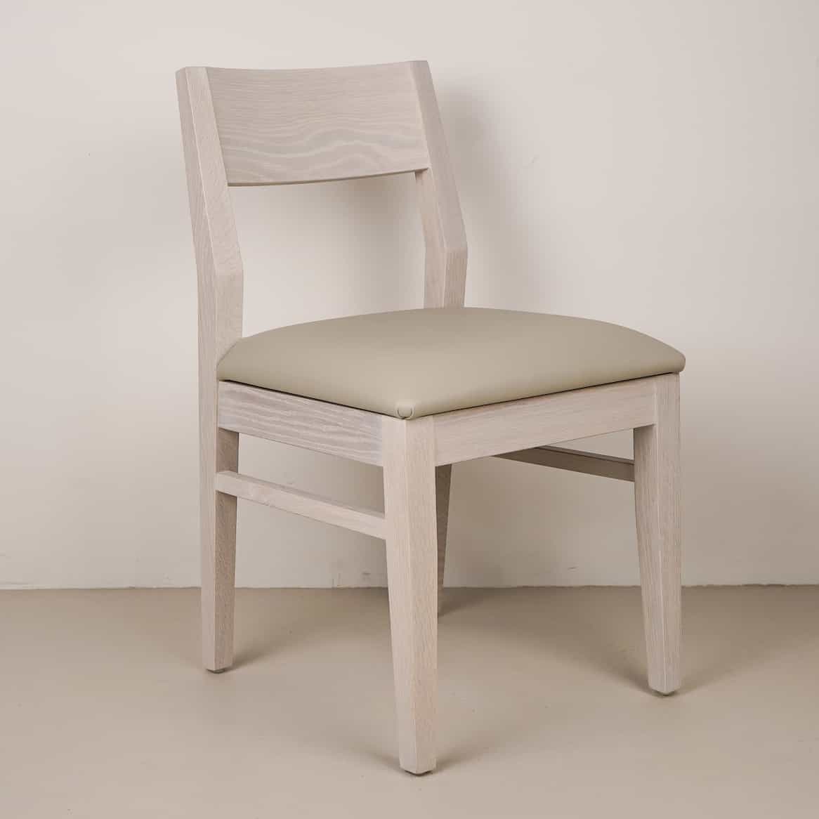 mushroom faux leather seat on white oak chair