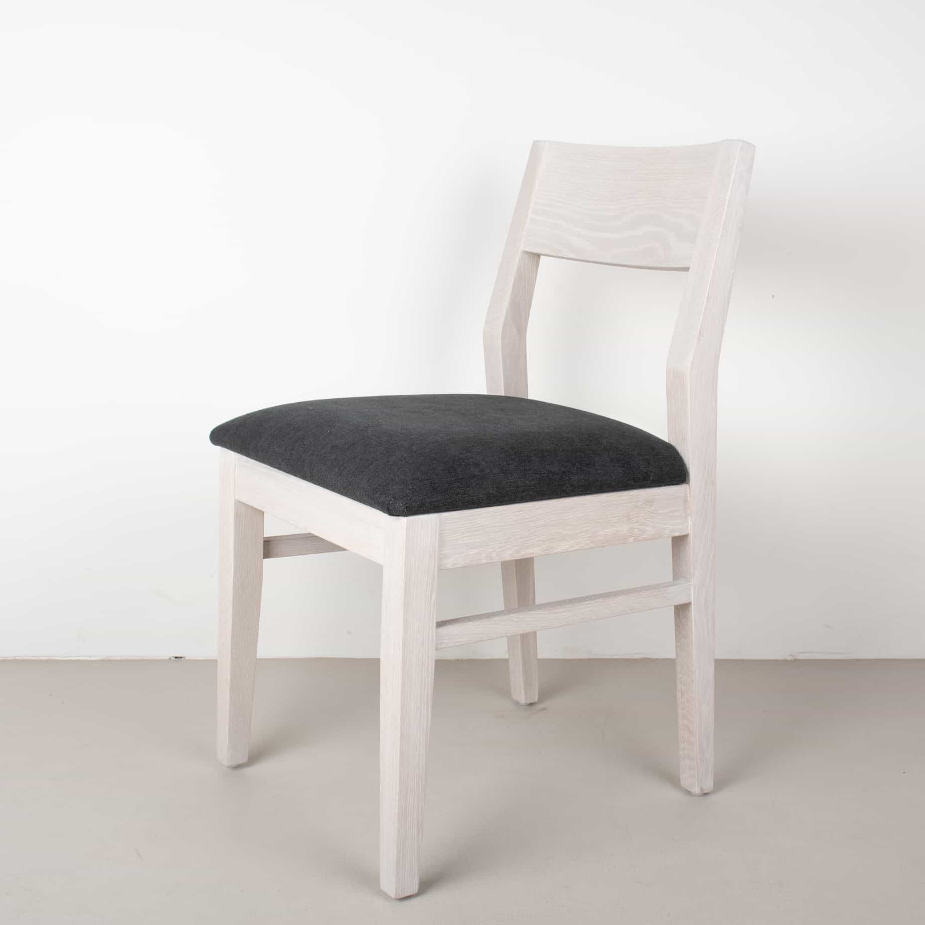 raven fabric seat on white oak chair