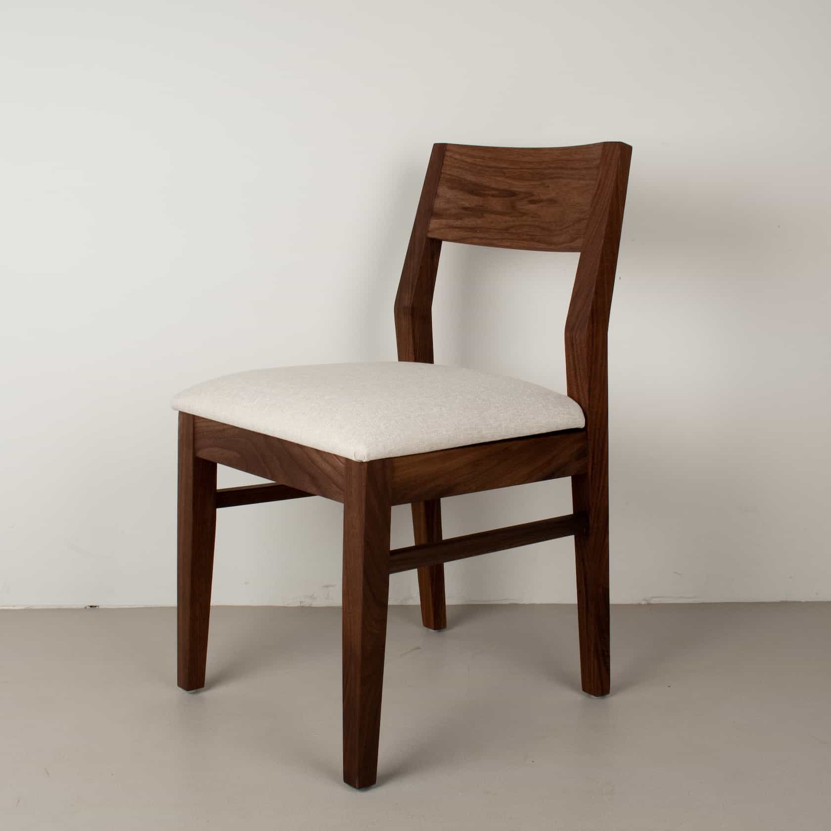 bone fabric seat on walnut chair
