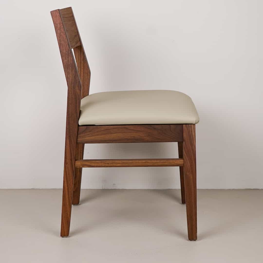 mushroom faux leather seat on walnut chair