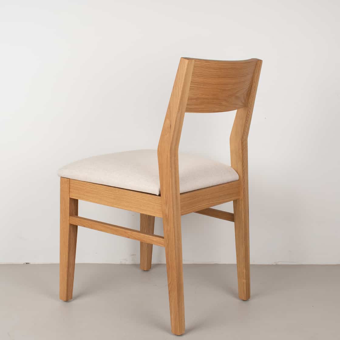 bone fabric seat on natural oak chair