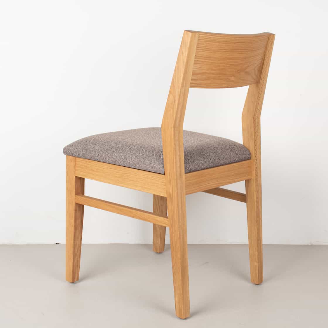 graphite faux leather seat on natural oak chair