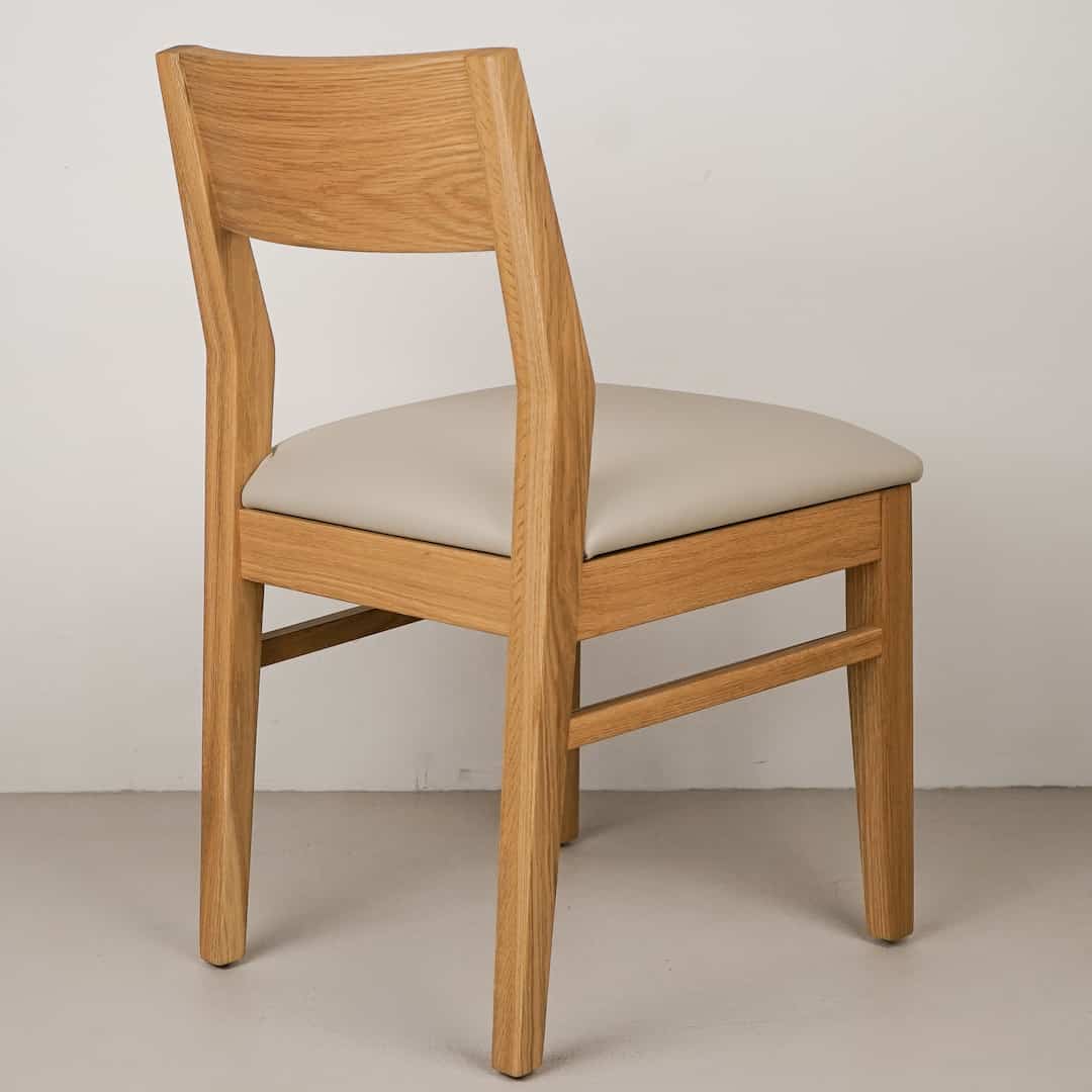 mushroom faux leather seat on natural oak chair