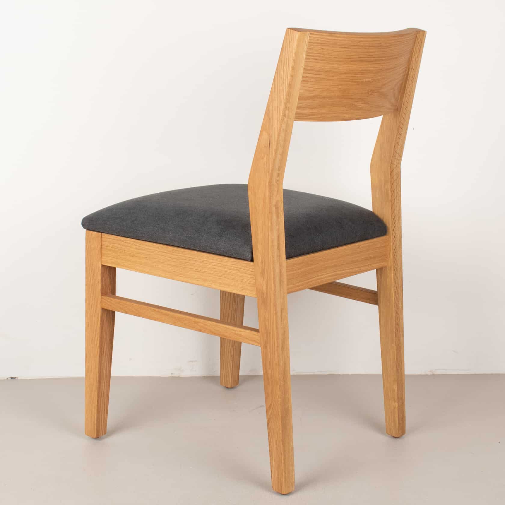 raven fabric seat on natural oak chair