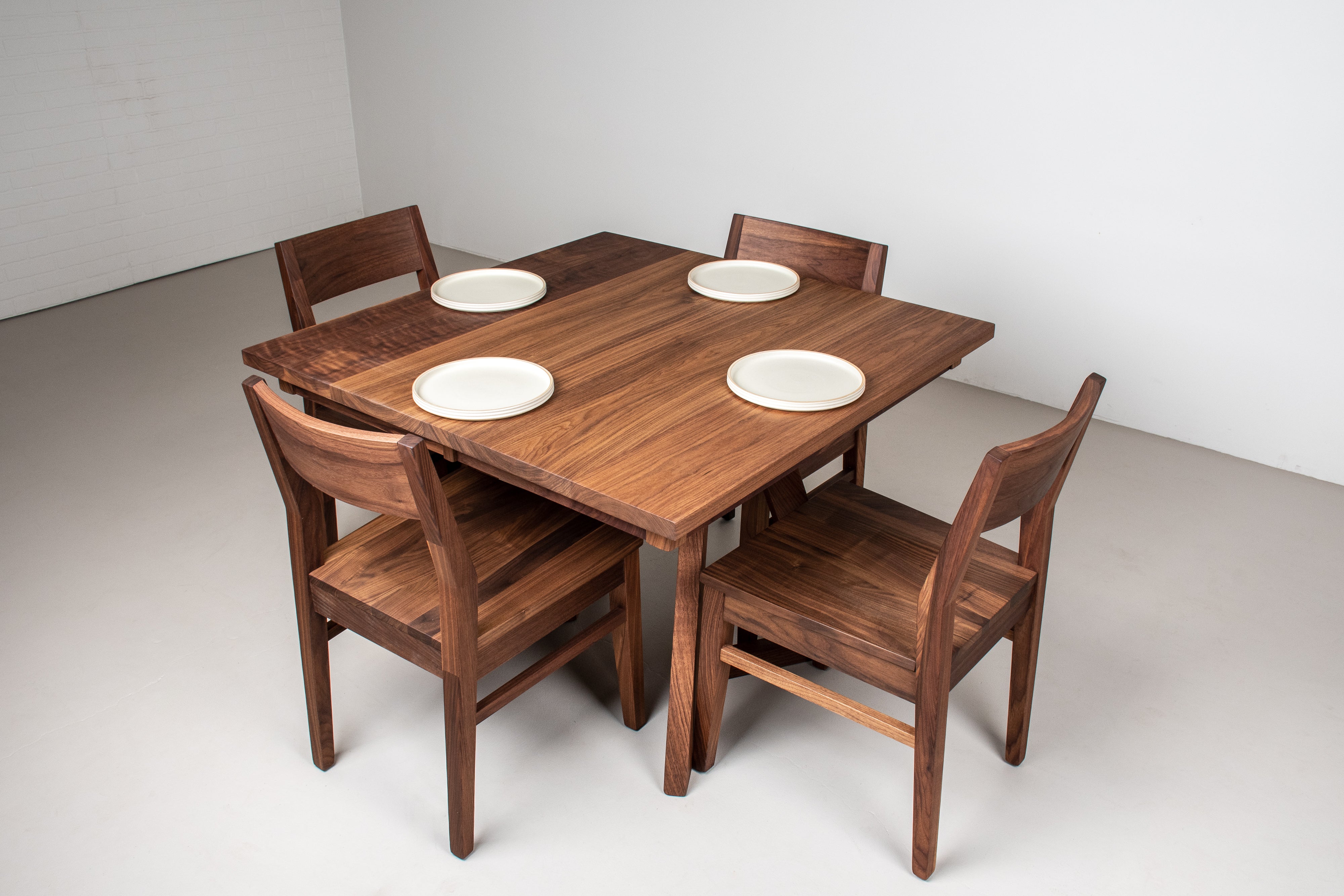 walnut table with walnut chairs