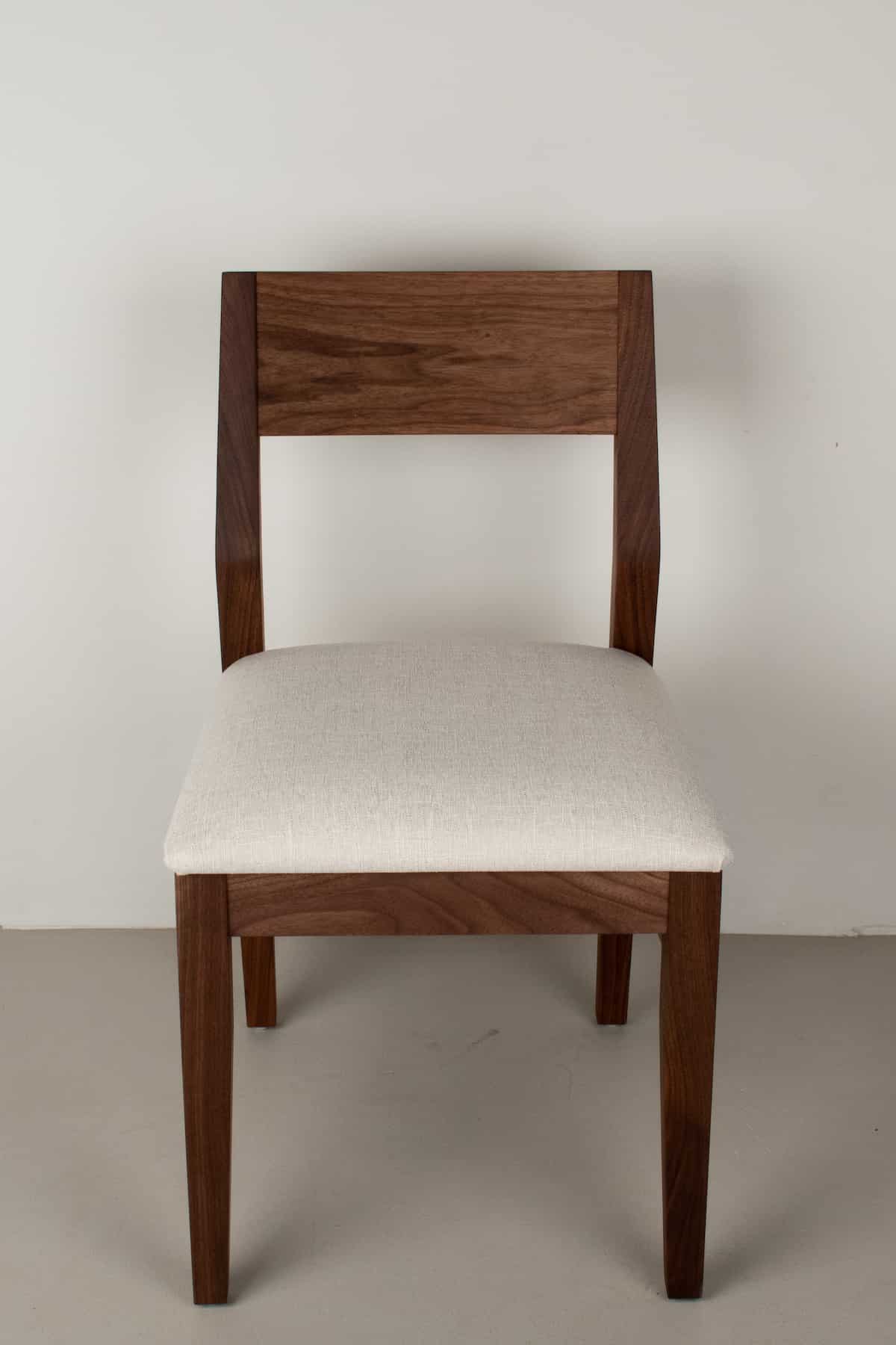 bone fabric seat on walnut chair