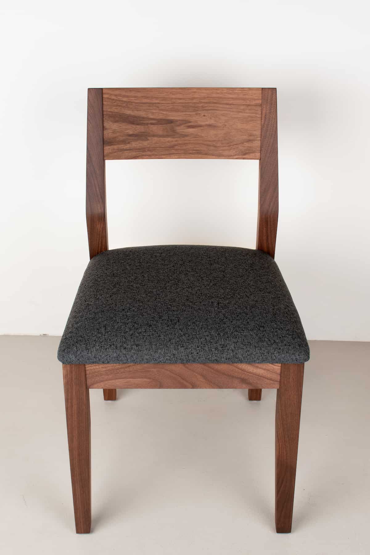 charcoal fabric seat on walnut chair