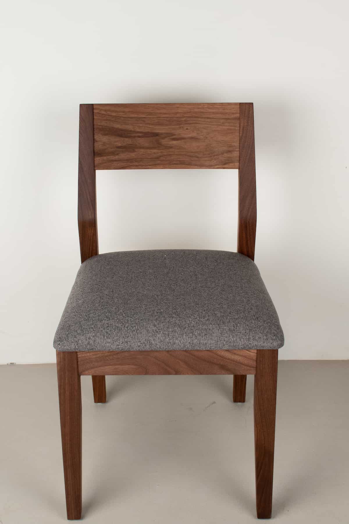 graphite faux leather seat on walnut chair