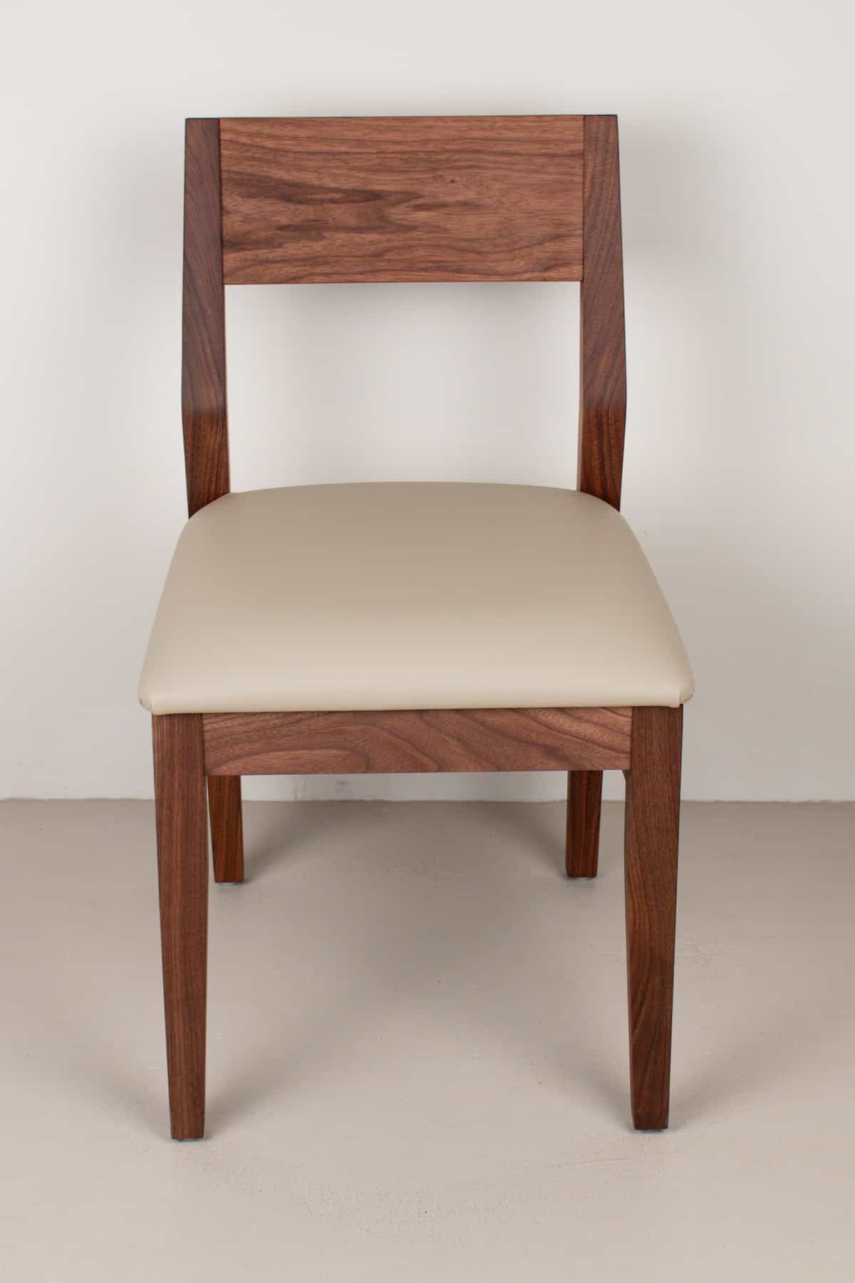 mushroom faux leather seat on walnut chair