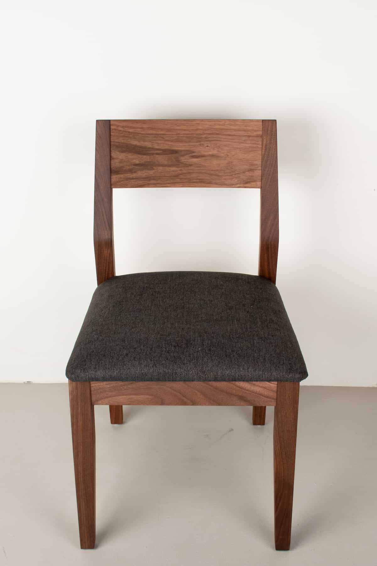 raven fabric seat on walnut chair