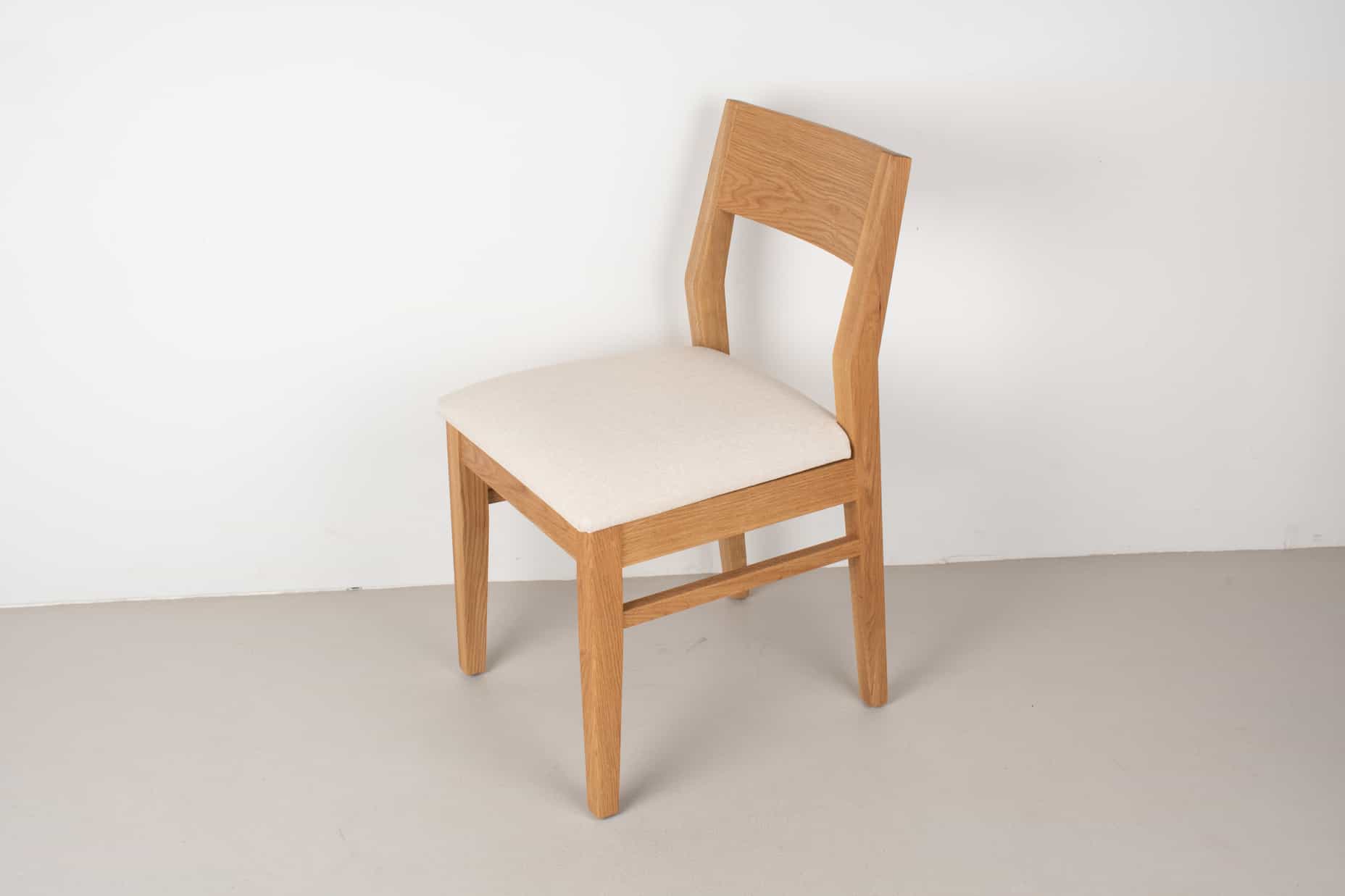 bone fabric seat on natural oak chair