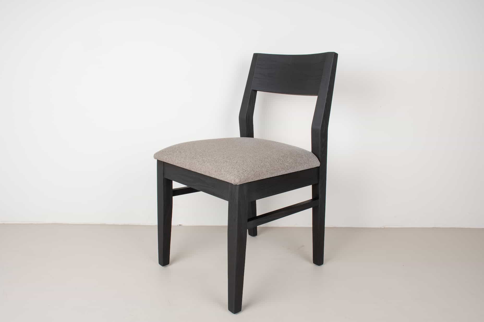 oak Aubrey chair in black with clay cushion