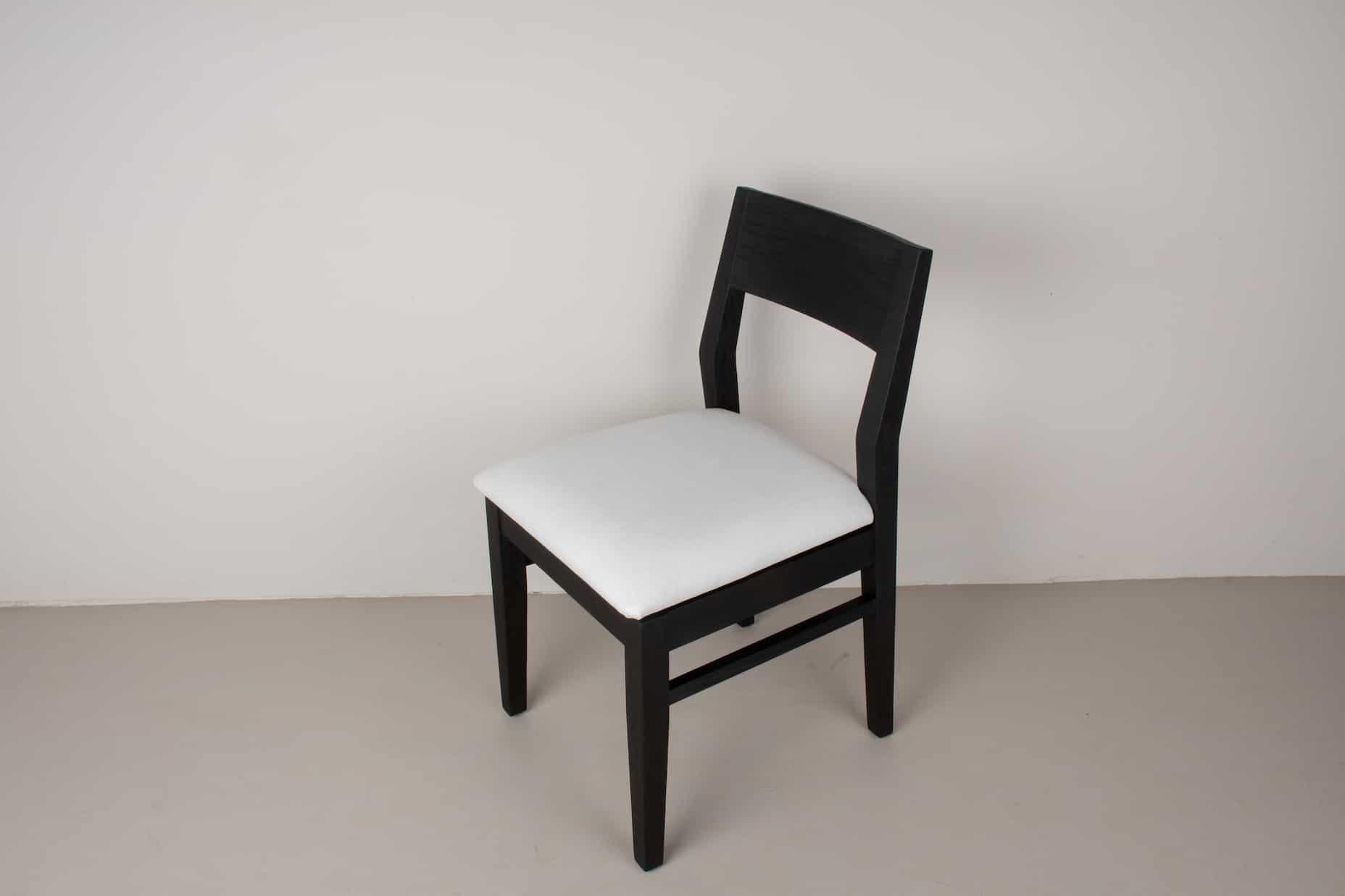 oak Aubrey chair in black with swan cushion