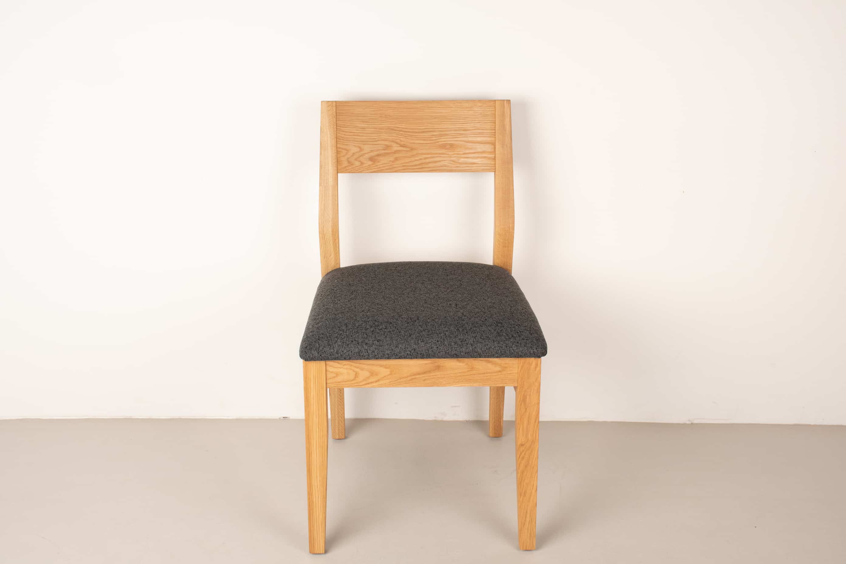 oak Aubrey chair in natural with charcoal cushion