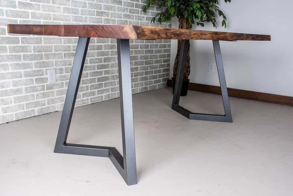 wood table on gunmetal legs