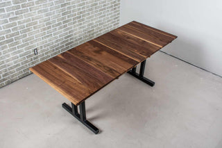 extendable kitchen table in walnut on steel tuttle legs