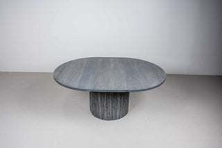 maple round extension table in gray on pedestal base