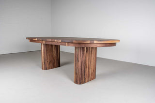 mid century extendable oval table on fluted walnut legs