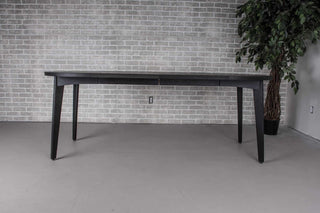 round oak extendable table on midcentury base
