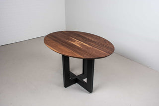 custom kitchen table with walnut oval top on a black ash pedestal base