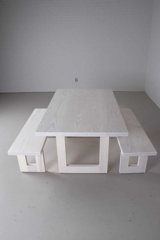 white wood table with 2 benches