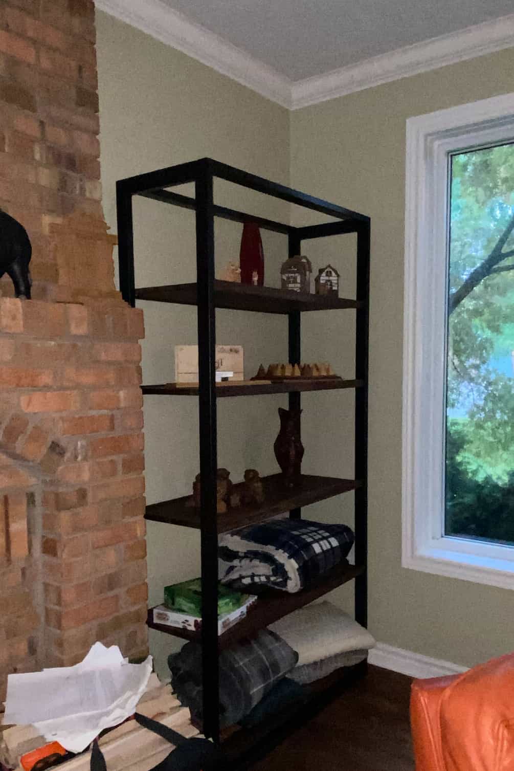 walnut bookshelves in a family room