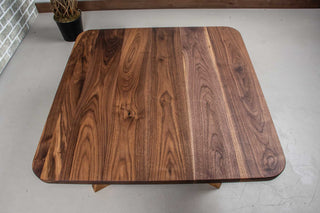 square walnut coffee table on wood legs