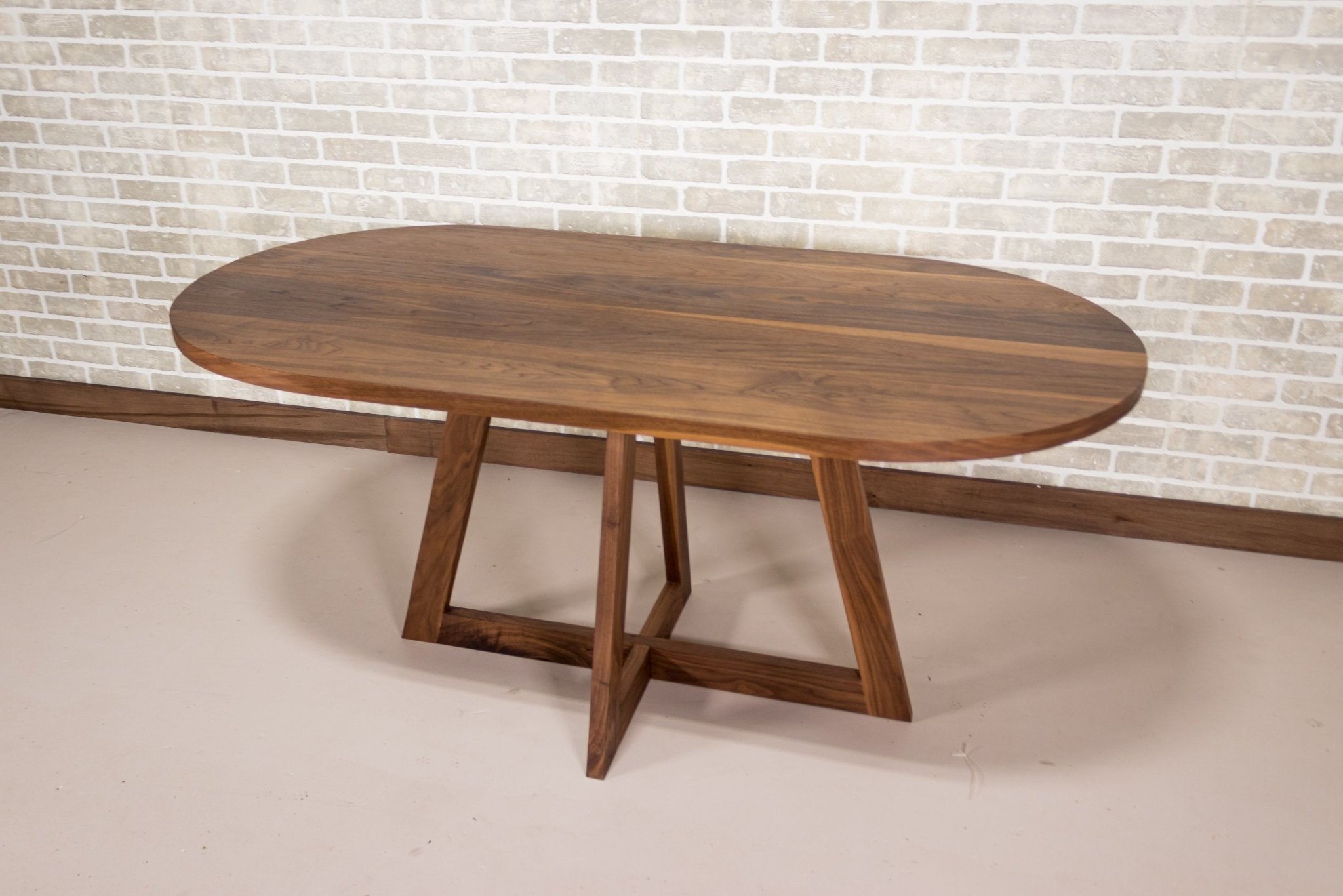 Custom walnut racetrack table for Danielle - Loewen Design Studios
