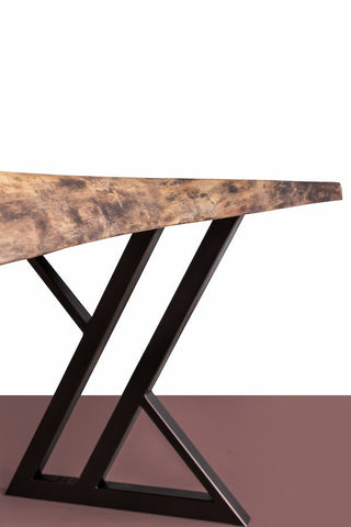 A Live Edge Dining Table with a Steel Leg