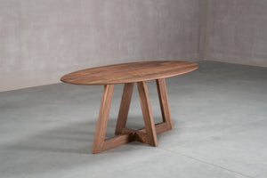 racetrack oval table made of solid wood on single cross pedestal base