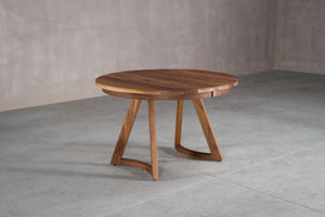 round dining table made of solid walnut