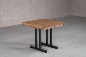 square walnut dining table with 4 dining chairs