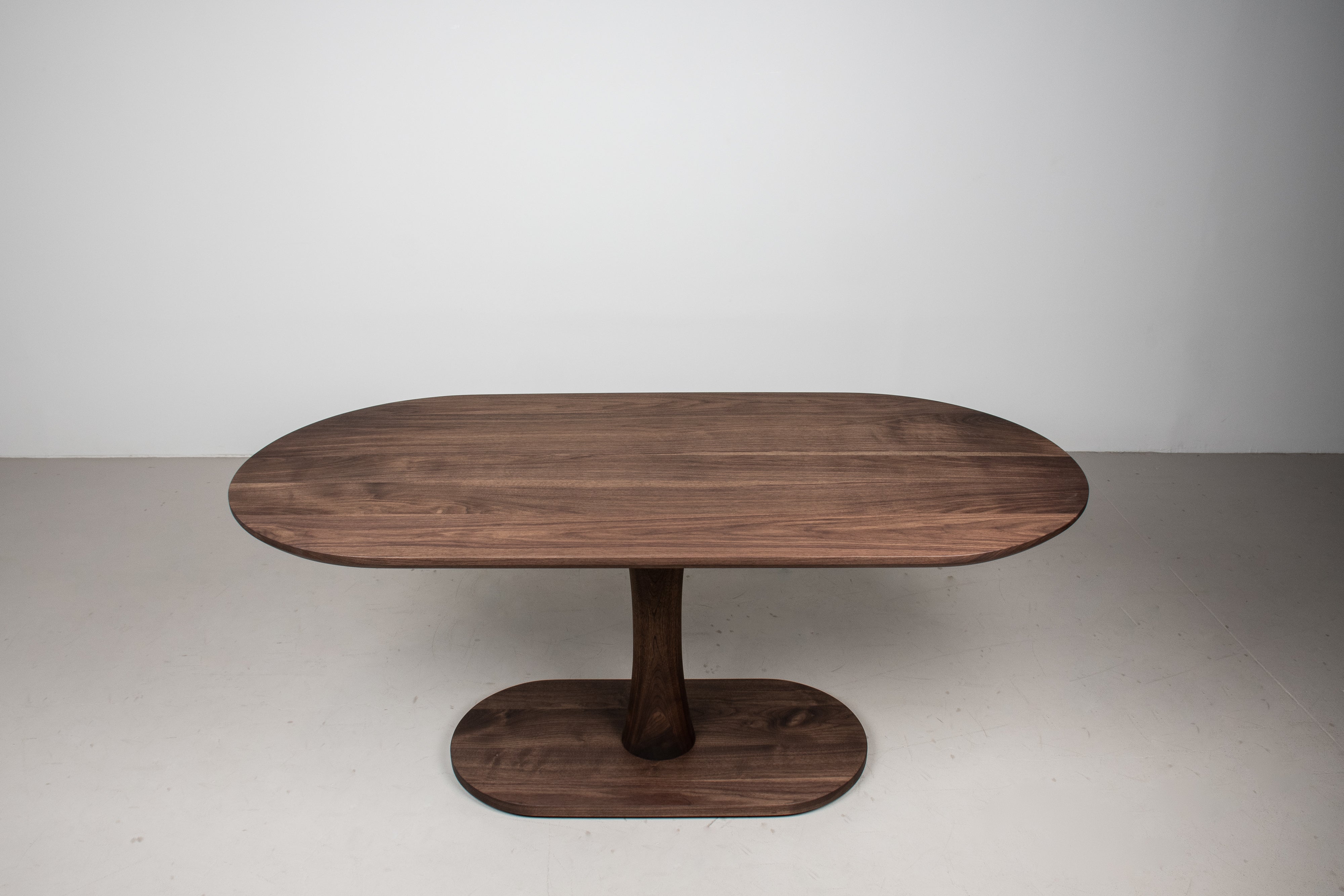 Custom Walnut Jarvis dining table for Chauncy Booth Interiors
