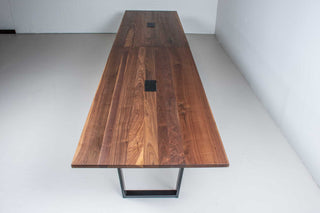 16 foot walnut conference table on black steel atlin legs