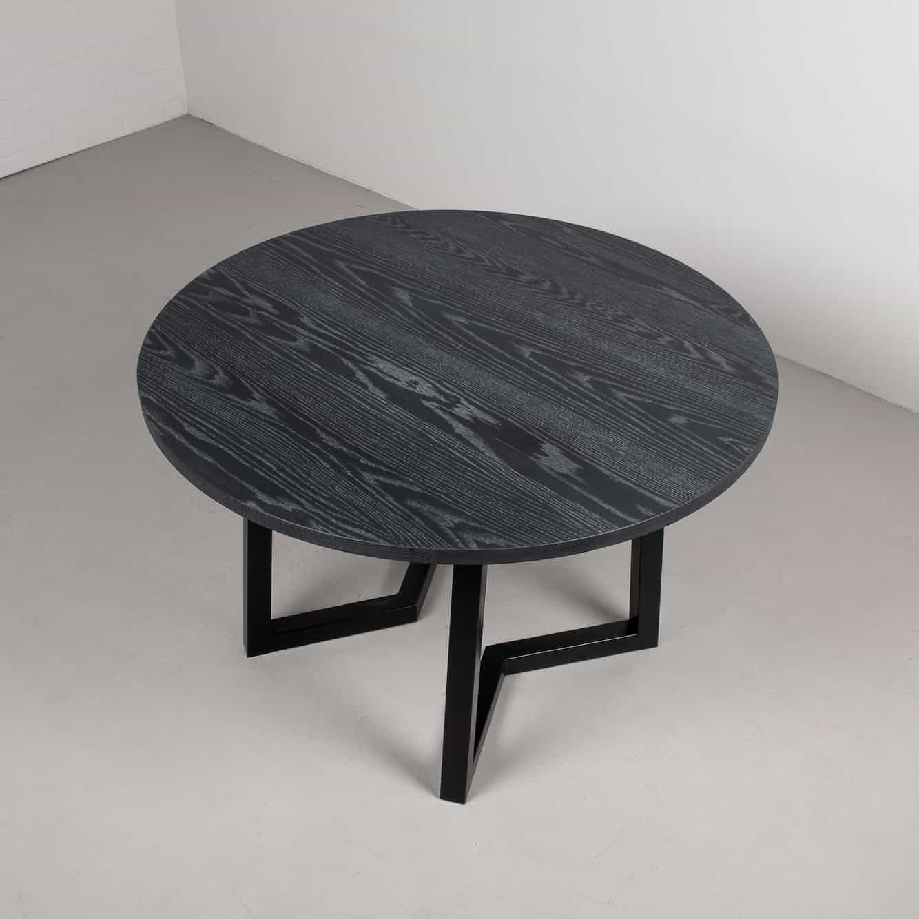 round oak table finished in custom black finish