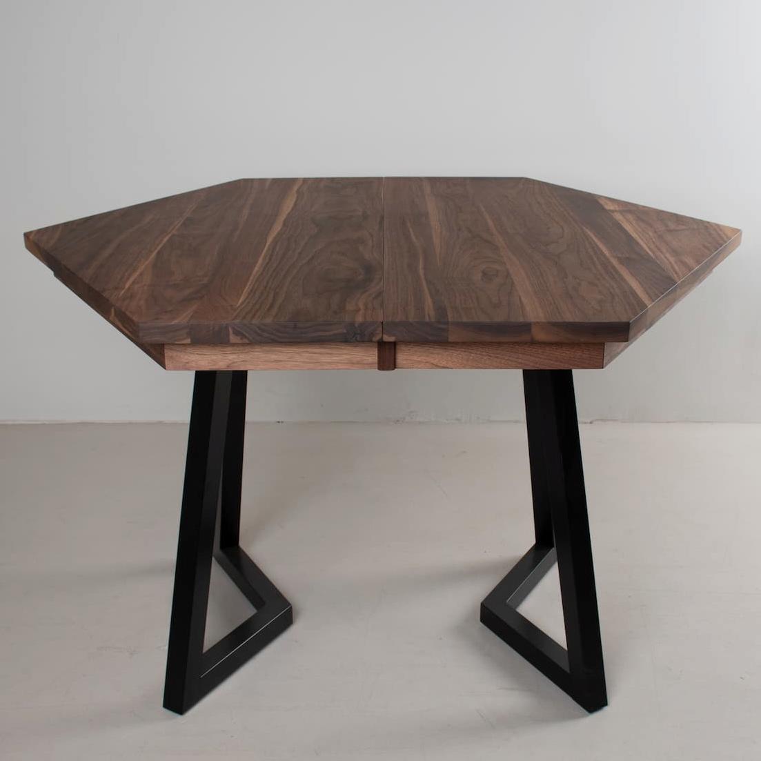 walnut extending hexagon table on steel legs