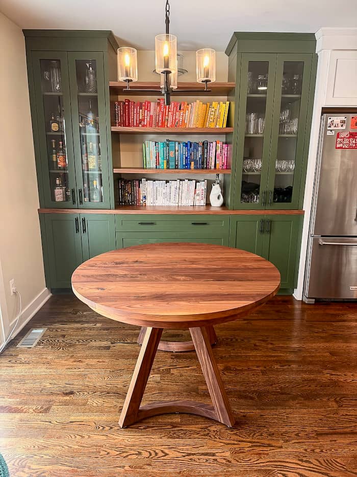 round Walnut extendable table 48x48 with 2-18
