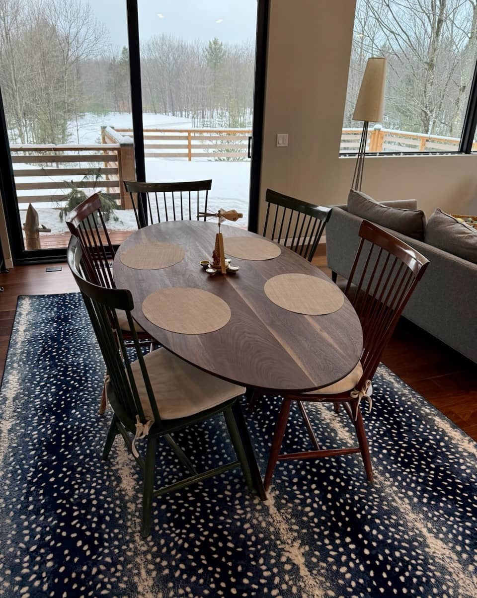 elliptical oval Walnut table in Pure D on Sproat base