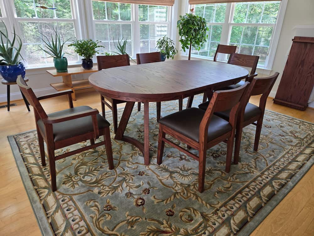 red oak oval extension table finished in brick with matching Aubrey chairs