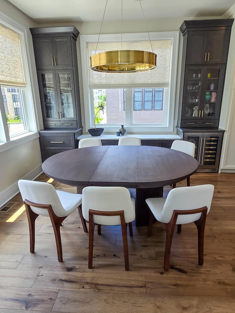 round extendable maple table finished in espresso