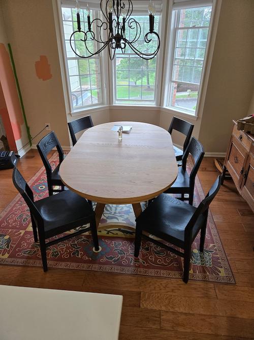 oval table with leaves in a dining room