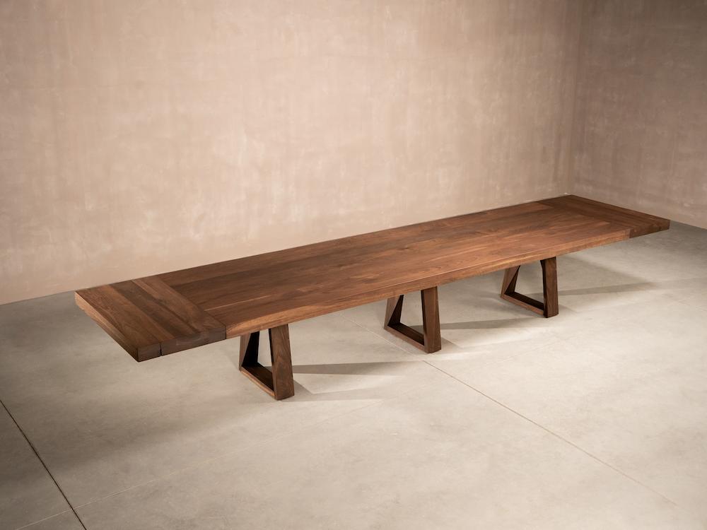 large walnut dining table with end leaves