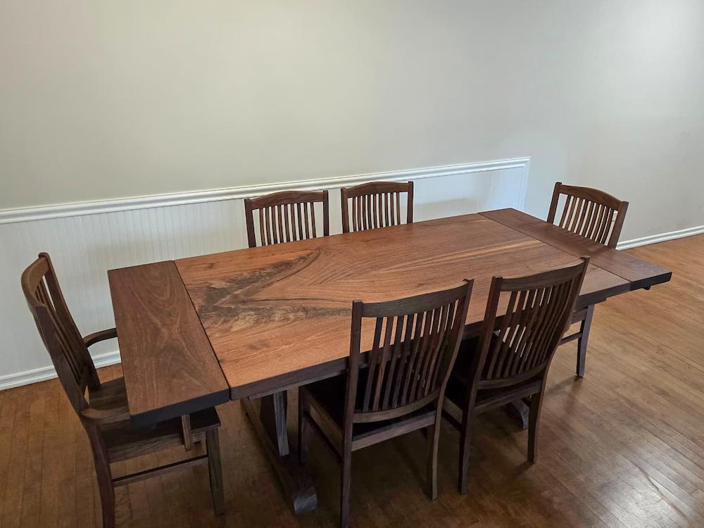 walnut dining table with matching chairs