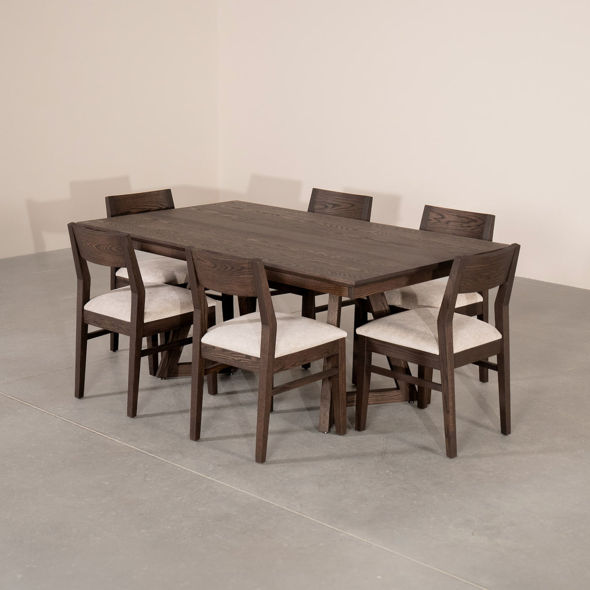 extendable Red Oak table 42” wide x  84” long, finished in Dark Roast W on Caldwell legs; shown with Aubrey chairs