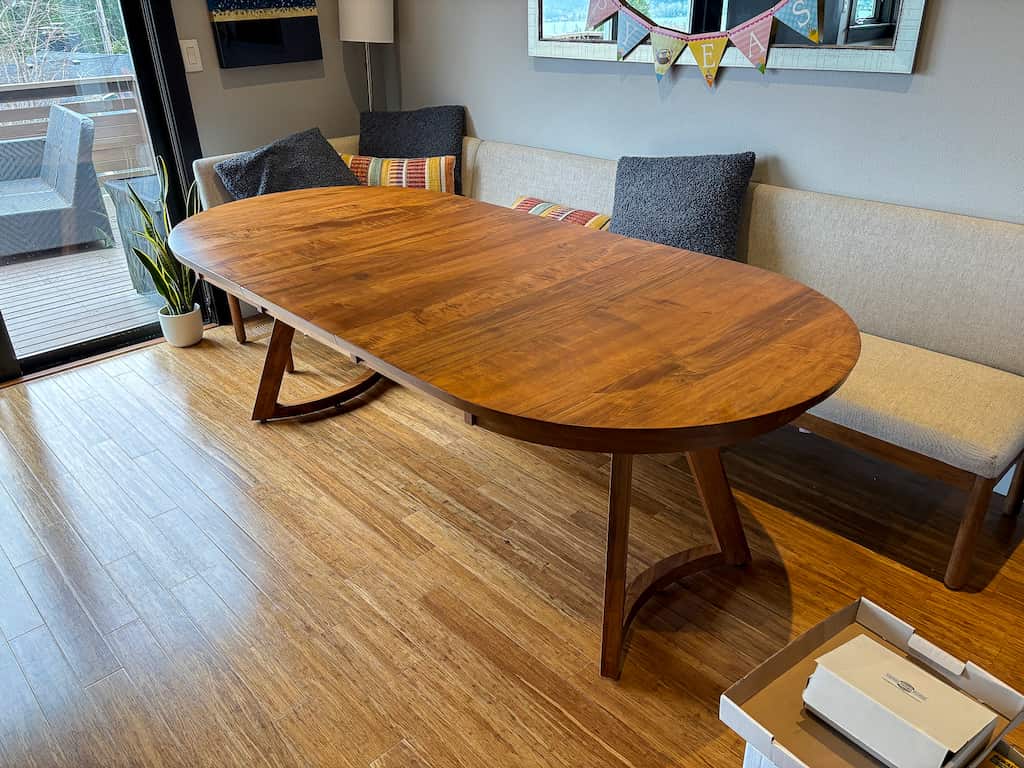 round extendable table in maple finished in cinnamon