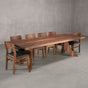 bookmatch Walnut table 40” wide x 108” long, finished in Pure D on Alta legs; shown with Walnut Aubrey chairs